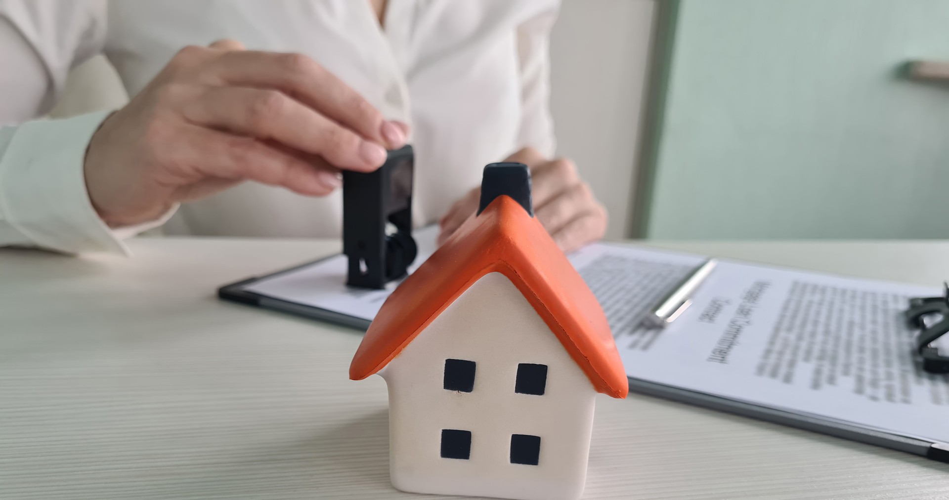 Documents deal with house with official seal